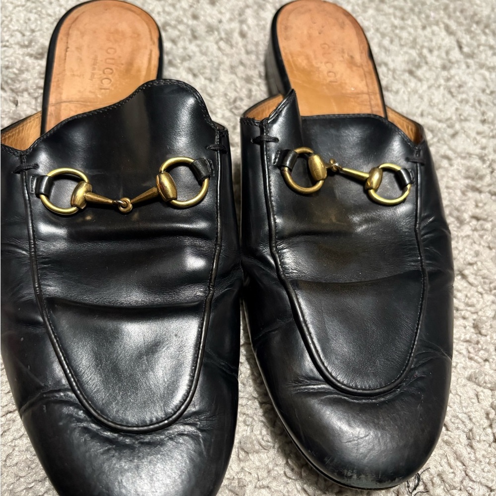 Gucci Black Leather Mules with Gold Accents